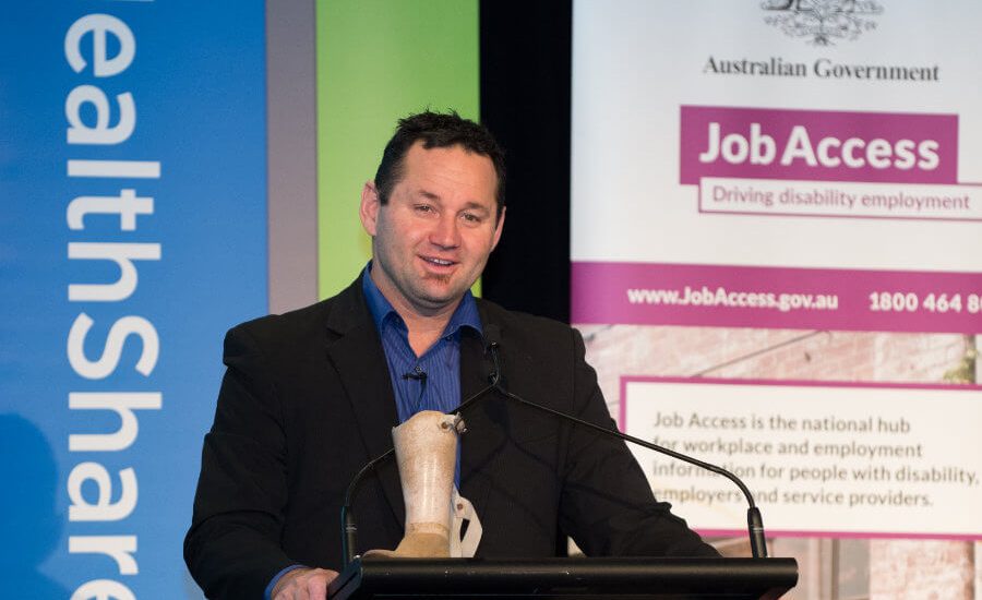 Don Elgin speaking at a corporate function